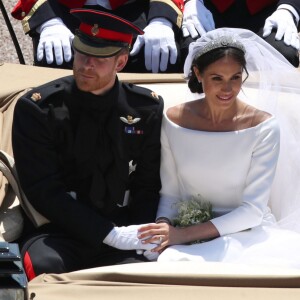 Le prince Harry et Meghan Markle, duc et duchesse de Sussex, ont fait une procession dans le landau Ascot après leur mariage en la chapelle St George à Windsor le 19 mai 2018, à la rencontre du public dans toute la ville de Windsor et le long du Long Walk.