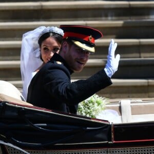 Le prince Harry et Meghan Markle, duc et duchesse de Sussex, ont fait une procession dans le landau Ascot après leur mariage en la chapelle St George à Windsor le 19 mai 2018, à la rencontre du public dans toute la ville de Windsor et le long du Long Walk.