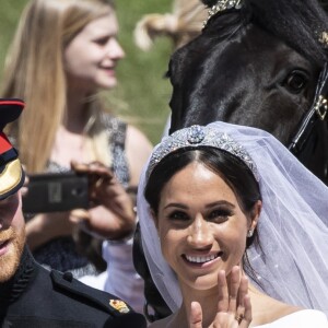 Meghan Markle et le prince Harry, duc et duchesse de Sussex, ont effectué une procession dans le landau Ascot après leur mariage en la chapelle St George à Windsor le 19 mai 2018, à la rencontre du public dans toute la ville de Windsor et le long du Long Walk.