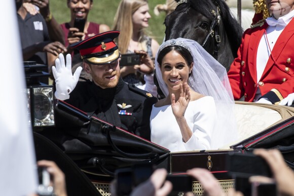 Meghan Markle et le prince Harry, duc et duchesse de Sussex, ont effectué une procession dans le landau Ascot après leur mariage en la chapelle St George à Windsor le 19 mai 2018, à la rencontre du public dans toute la ville de Windsor et le long du Long Walk.