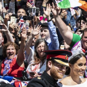 Meghan Markle et le prince Harry, duc et duchesse de Sussex, ont effectué une procession dans le landau Ascot après leur mariage en la chapelle St George à Windsor le 19 mai 2018, à la rencontre du public dans toute la ville de Windsor et le long du Long Walk.