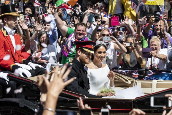 Meghan Markle et le prince Harry, duc et duchesse de Sussex, ont effectué une procession dans le landau Ascot après leur mariage en la chapelle St George à Windsor le 19 mai 2018, à la rencontre du public dans toute la ville de Windsor et le long du Long Walk.