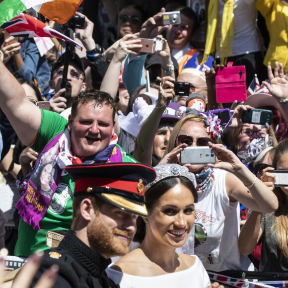 Meghan Markle et le prince Harry, duc et duchesse de Sussex, ont effectué une procession dans le landau Ascot après leur mariage en la chapelle St George à Windsor le 19 mai 2018, à la rencontre du public dans toute la ville de Windsor et le long du Long Walk.