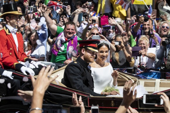 Meghan Markle et le prince Harry, duc et duchesse de Sussex, ont effectué une procession dans le landau Ascot après leur mariage en la chapelle St George à Windsor le 19 mai 2018, à la rencontre du public dans toute la ville de Windsor et le long du Long Walk.