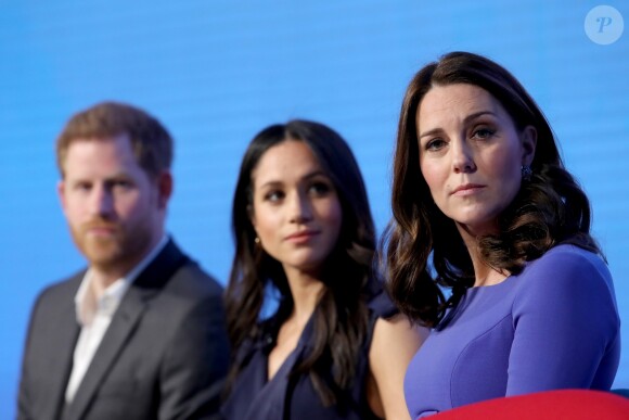 Harry, Meghan et Catherine. Kate Middleton, duchesse de Cambridge, enceinte de huit mois (en robe Seraphine), Meghan Markle (dans un ensemble Jason Wu), le prince William et le prince Harry étaient rassemblés pour la première fois en engagement public le 28 février 2018 pour le premier Forum annuel de la Fondation royale, au siège social d'Aviva à Londres, autour du thème "Changer les choses ensemble".