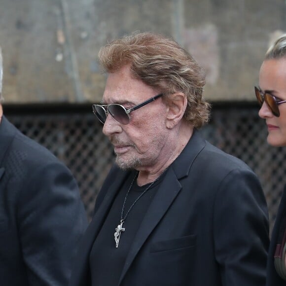 Johnny et Laeticia Hallyday lors des obsèques de Mireille Darc en l'église Saint-Sulpice à Paris le 1er septembre 2017