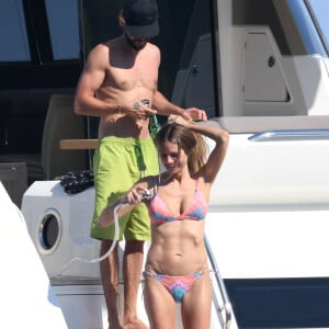Heidi Klum et son compagnon Tom Kaulitz à bord d'un yacht au large de Cannes en marge du 71e Festival International du Film de Cannes le 19 mai 2018.
