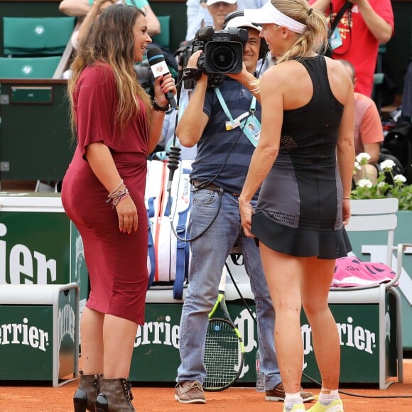 Marion Bartoli lors des internationaux de tennis de Roland Garros le 28 mai 2018. En atten­dant de redis­pu­ter des matchs, la spor­tive commente les rencontres pour Euro­sport à l'occa­sion du tour­noi de Roland-Garros. © Dominique Jacovides - Cyril Moreau / Bestimage