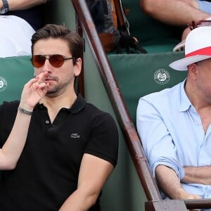 Audrey Lamy et son compagnon Thomas Sabatier dans les tribunes des internationaux de Roland Garros - jour 5 - à Paris, France, le 31 mai 2018. © Cyril Moreau - Dominique Jacovides/Bestimage