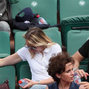 Audrey Lamy et son compagnon Thomas Sabatier dans les tribunes des internationaux de Roland Garros - jour 5 - à Paris, France, le 31 mai 2018. © Cyril Moreau - Dominique Jacovides/Bestimage