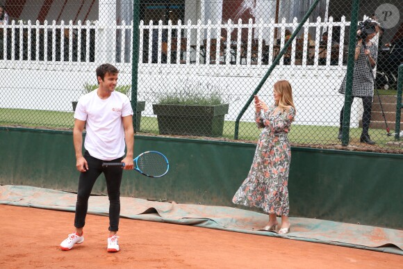 Exclusif - Caroline Receveur (enceinte) et son fiancé Hugo Philip - 26ème édition du Trophée des personnalités en marge des Internationaux de Tennis de Roland Garros à Paris. Le 5 juin 2018. © Denis Guignebourg / Bestimage