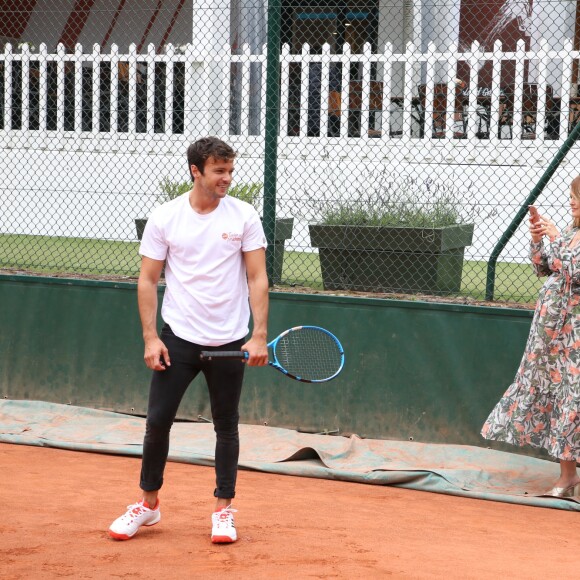 Exclusif - Caroline Receveur (enceinte) et son fiancé Hugo Philip - 26ème édition du Trophée des personnalités en marge des Internationaux de Tennis de Roland Garros à Paris. Le 5 juin 2018. © Denis Guignebourg / Bestimage