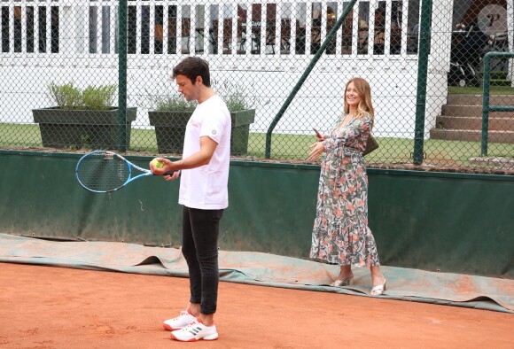 Exclusif - Caroline Receveur (enceinte) et son fiancé Hugo Philip - 26ème édition du Trophée des personnalités en marge des Internationaux de Tennis de Roland Garros à Paris. Le 5 juin 2018. © Denis Guignebourg / Bestimage