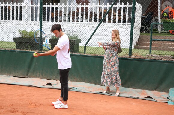 Exclusif - Caroline Receveur (enceinte) et son fiancé Hugo Philip - 26ème édition du Trophée des personnalités en marge des Internationaux de Tennis de Roland Garros à Paris. Le 5 juin 2018. © Denis Guignebourg / Bestimage