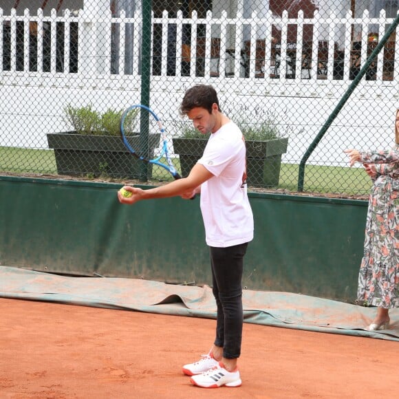 Exclusif - Caroline Receveur (enceinte) et son fiancé Hugo Philip - 26ème édition du Trophée des personnalités en marge des Internationaux de Tennis de Roland Garros à Paris. Le 5 juin 2018. © Denis Guignebourg / Bestimage