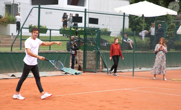 Exclusif - Caroline Receveur (enceinte) et son fiancé Hugo Philip - 26ème édition du Trophée des personnalités en marge des Internationaux de Tennis de Roland Garros à Paris. Le 5 juin 2018. © Denis Guignebourg / Bestimage