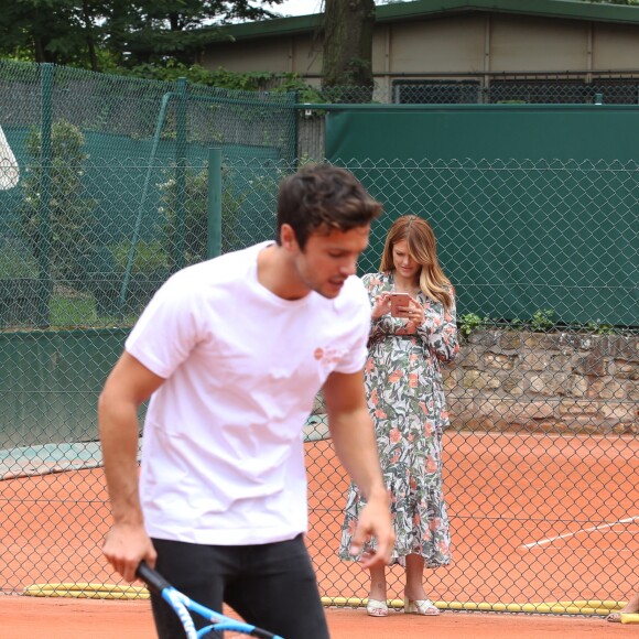 Exclusif - Caroline Receveur (enceinte) et son fiancé Hugo Philip - 26ème édition du Trophée des personnalités en marge des Internationaux de Tennis de Roland Garros à Paris. Le 5 juin 2018. © Denis Guignebourg / Bestimage