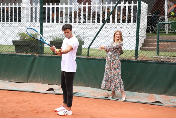Exclusif - Caroline Receveur (enceinte) et son fiancé Hugo Philip - 26ème édition du Trophée des personnalités en marge des Internationaux de Tennis de Roland Garros à Paris. Le 5 juin 2018. © Denis Guignebourg / Bestimage