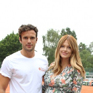 Exclusif - Caroline Receveur (enceinte) et son fiancé Hugo Philip - 26ème édition du Trophée des personnalités en marge des Internationaux de Tennis de Roland Garros à Paris. Le 5 juin 2018. © Denis Guignebourg / Bestimage