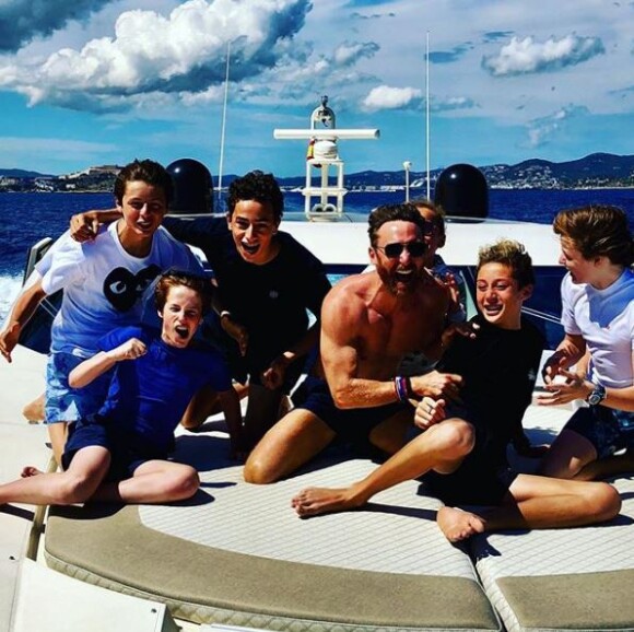 David Guetta avec son fils Elvis et des amis à lui, à Ibiza, juin 2018