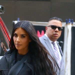 Kim Kardashian et sa fille North rentrent a leur hotel a New York, le 14 juin 2018.