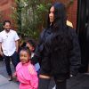Kim Kardashian et sa fille North West à la sortie de l'hôtel Mercer à New York. Le 14 juin 2018.