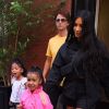 Kim Kardashian, sa fille North West, Jonathan Cheban à la sortie de l'hôtel Mercer à New York. Le 14 juin 2018.
