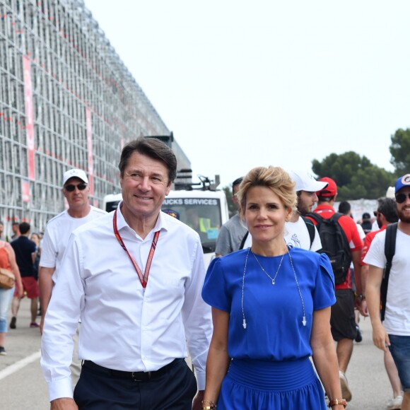 Exclusif - Christian Estrosi et sa femme Laura Tenoudji durant la journée d'essai du Grand Prix de France au Castellet le 23 juin 2018. Ils ont visité le Village situé derrière les tribunes et ouvert au public. Christian Estrosi, le maire de Nice et le vice président du Conseil Regional de PACA, est à l'origine du retour du Grand prix de France au Circuit Paul Ricard. © Bruno Bebert/Bestimage