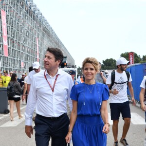 Exclusif - Christian Estrosi et sa femme Laura Tenoudji durant la journée d'essai du Grand Prix de France au Castellet le 23 juin 2018. Ils ont visité le Village situé derrière les tribunes et ouvert au public. Christian Estrosi, le maire de Nice et le vice président du Conseil Regional de PACA, est à l'origine du retour du Grand prix de France au Circuit Paul Ricard. © Bruno Bebert/Bestimage