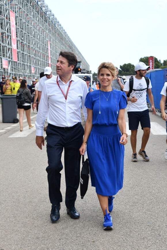 Exclusif - Christian Estrosi et sa femme Laura Tenoudji durant la journée d'essai du Grand Prix de France au Castellet le 23 juin 2018. Ils ont visité le Village situé derrière les tribunes et ouvert au public. Christian Estrosi, le maire de Nice et le vice président du Conseil Regional de PACA, est à l'origine du retour du Grand prix de France au Circuit Paul Ricard. © Bruno Bebert/Bestimage