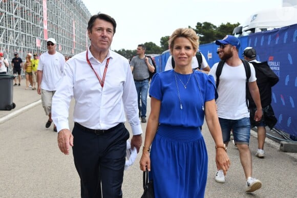 Exclusif - Christian Estrosi et sa femme Laura Tenoudji durant la journée d'essai du Grand Prix de France au Castellet le 23 juin 2018. Ils ont visité le Village situé derrière les tribunes et ouvert au public. Christian Estrosi, le maire de Nice et le vice président du Conseil Regional de PACA, est à l'origine du retour du Grand prix de France au Circuit Paul Ricard. © Bruno Bebert/Bestimage