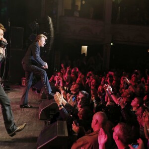 EXCLU - Johnny Hallyday et Greg Zlap sur la scène du Théâtre de Paris pour les 70 ans du rockeurs, le 15 juin 2013.