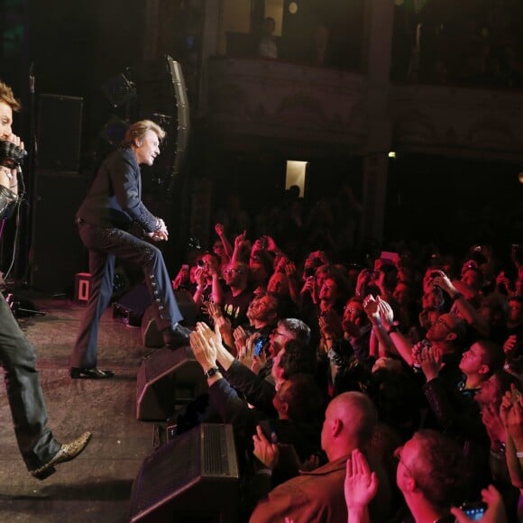 EXCLU - Johnny Hallyday et Greg Zlap sur la scène du Théâtre de Paris pour les 70 ans du rockeurs, le 15 juin 2013.