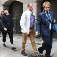 Catherine Devallonne et Patrick Lionnet, les parents de Sophie Lionnet, à leur sortie de  la cour criminelle de l'Old Bailey, à Londres, le 24 mai 2018. 