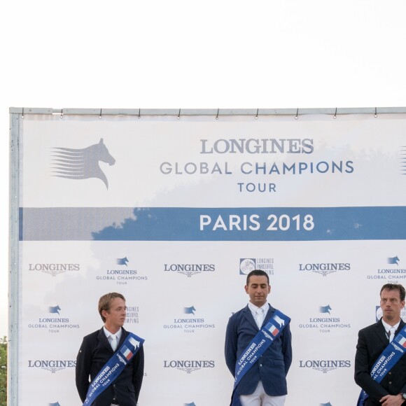 Bertram Allen (deuxième), Sameh El Dahan (premier) et Harrie Smolders (troisième) lors de la remise du Prix "Longines Global Champions Tour Grand Prix of Paris" pendant le Longines Paris Eiffel Jumping au Champ de Mars à Paris, le 7 juillet 2018. © Pierre Perusseau/Bestimage