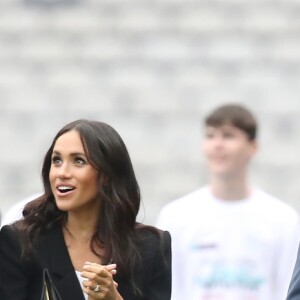 Le prince Harry, duc de Sussex et sa femme Meghan Markle, duchesse de Sussex assistent aux jeux gaélique à Croke Park à Dublin le 11 juillet 2018