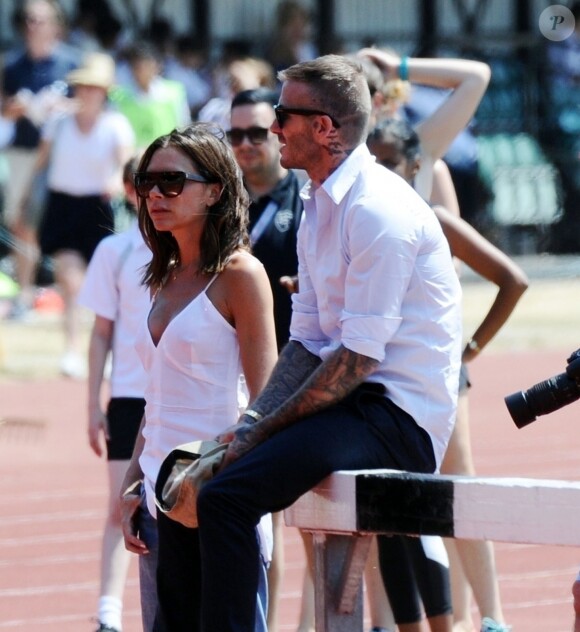 Exclusif - David Beckham et son épouse Victoria Beckham ont été aperçus plus amoureux que jamais alors qu'ils assistaient à une compétition d'athlétisme à Perivale Park à Londres, le 3 juillet 2018.