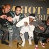 Steven Nzonzi, Adil Rami, Paul Pogba et Samuel Umtiti posent avec le trophée de la Coupe du monde FIFA 2018 lors de la soirée Maxim Hot 100 Experience au Hollywood Palladium à Los Angeles, le 21 juillet 2018.