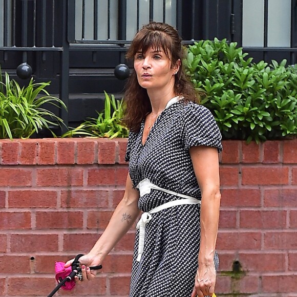 Exclusif - Helena Christensen sort avec son chien dans la rue à New York le 19 juin 2018.