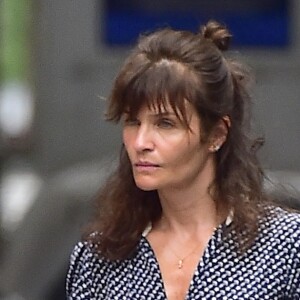 Exclusif - Helena Christensen sort avec son chien dans la rue à New York le 19 juin 2018.