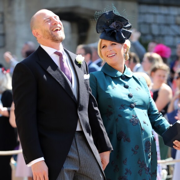 Mike Tindall et sa femme Zara Phillips Tindall, alors enceinte de leur fille Lena, au mariage du prince Harry et de Meghan Markle le 19 mai 2018 à Windsor.