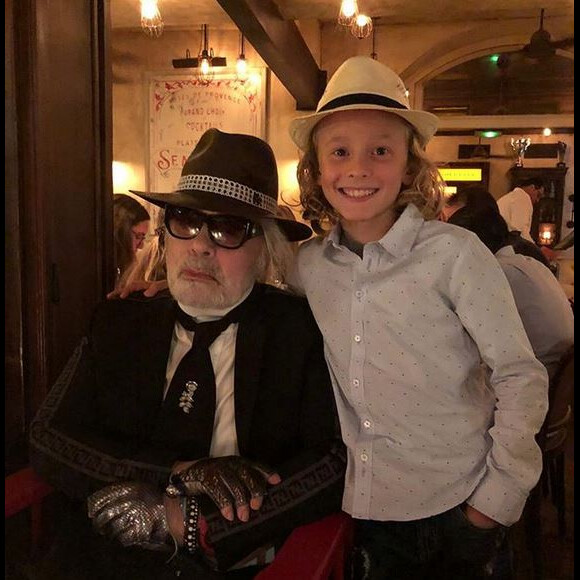 Karl Lagerfeld et son filleuil Hudson. Août 2018.