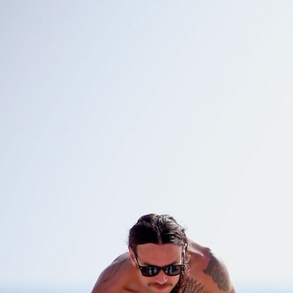 Exclusif -  Kesha et son compagnon Brad Ashenfelter passent une journée romantique sur la plage de Todos Santos au Mexique, le 16 août 2018