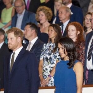 Le prince Harry et sa femme la duchesse Meghan de Sussex lors du concert caritatif 100 Days to Peace à Central Hall Westminster à Londres, le 6 septembre 2018, au profit d'associations en faveur des blessés de guerre et de la santé mentale.