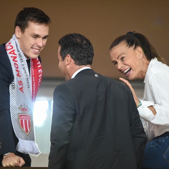 Louis Ducruetet sa mère la princesse Stéphanie de Monaco avec Ludovic Giuly - Match de football entre l'AS Monaco et l'Atlético de Madrid lors de la 1ère journée de Ligue des champions au stade Louis-II à Monaco le 18 septembre 2018. L'Atlético de Madrid a battu l'AS Monaco sur le score de 2 buts à 1. © Lionel Urman/Bestimage