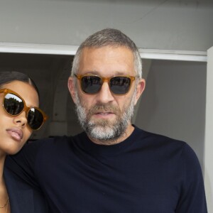 Vincent Cassel, Tina Kunakey au défilé Roberto Cavalli lors de la Fashion Week de Milan prêt-à-porter printemps/été 2019 le 22 septembre 2018.