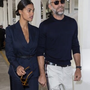 Vincent Cassel, Tina Kunakey au défilé Roberto Cavalli lors de la Fashion Week de Milan prêt-à-porter printemps/été 2019 le 22 septembre 2018.