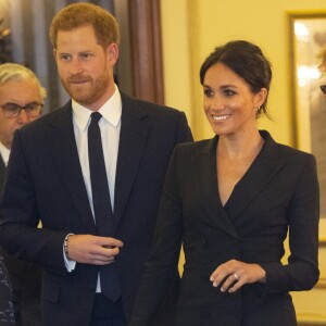 Le prince Harry, duc de Sussex, et Meghan Markle, duchesse de Sussex, assistent à un gala de bienfaisance au théâtre Victoria au bénéfice de l'ONG Sentebale à Londres le 29 août 2018.