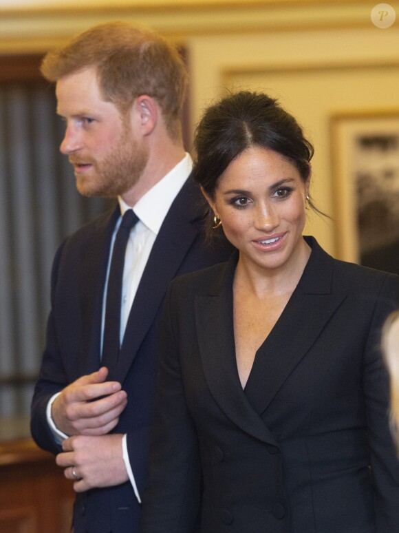 Le prince Harry, duc de Sussex, et Meghan Markle, duchesse de Sussex, assistent à un gala de bienfaisance au théâtre Victoria au bénéfice de l'ONG Sentebale à Londres le 29 août 2018.
