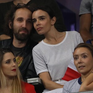 Elodie Bouchez et son mari Thomas Bangalter (groupe Daft Punk) dans les tribunes du stade de France lors du match de ligue des nations opposant la France à l'Allemagne à Saint-Denis, Seine Saint-Denis, France, le 16 octobre 2018.